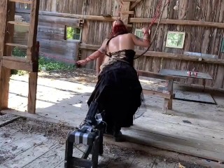 Tied up and fucked by machine in barn